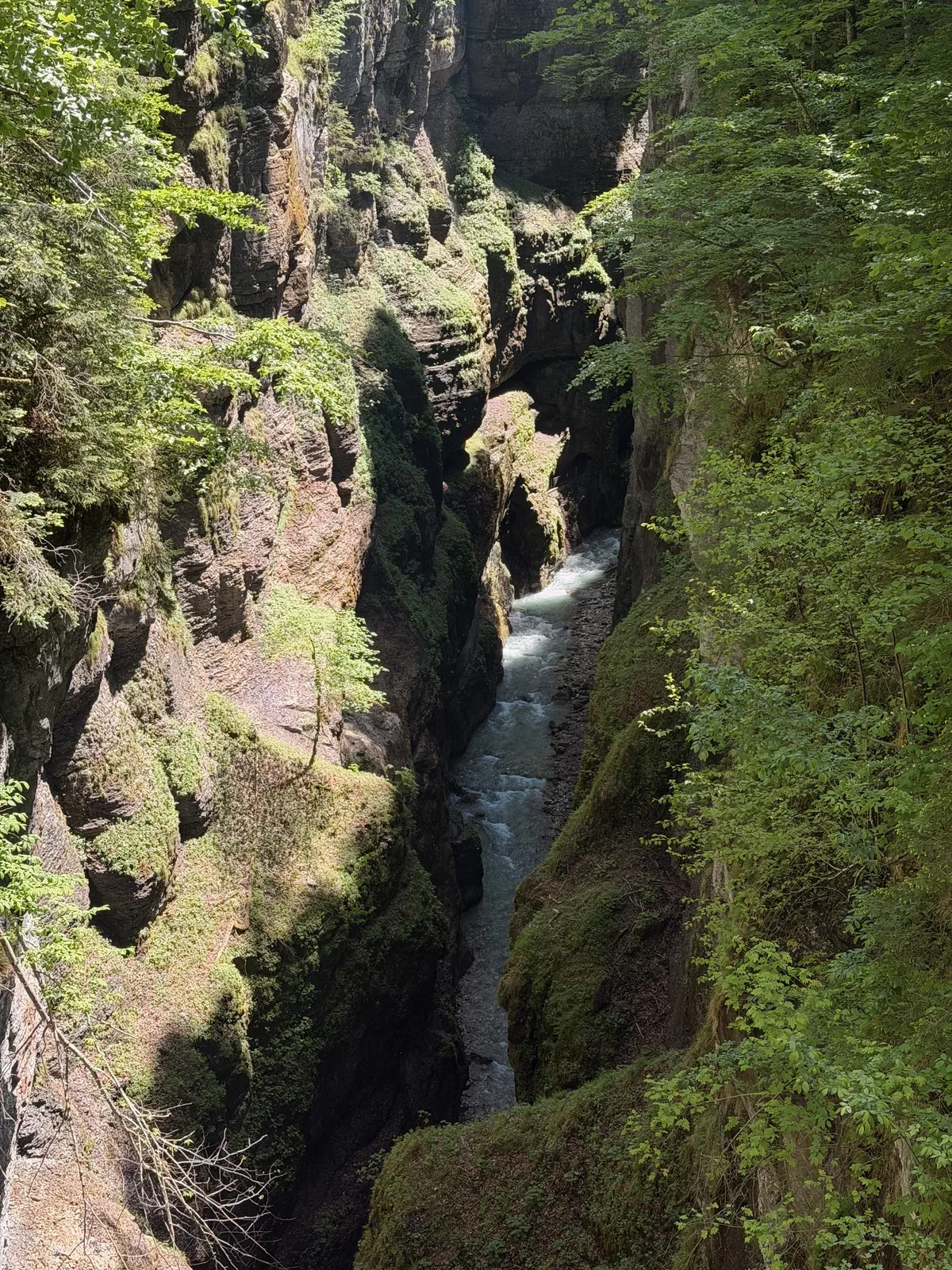 Partnachklamm gorge with narrow rock passage and running water, Zugspitz Ultratrail 107K at KM 82.