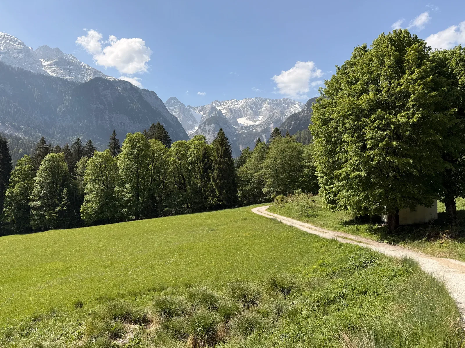 Meadow path above Garmisch-Partenkirchen with views back to the Wetterstein mountains, ZUT 107K at KM 99.7.